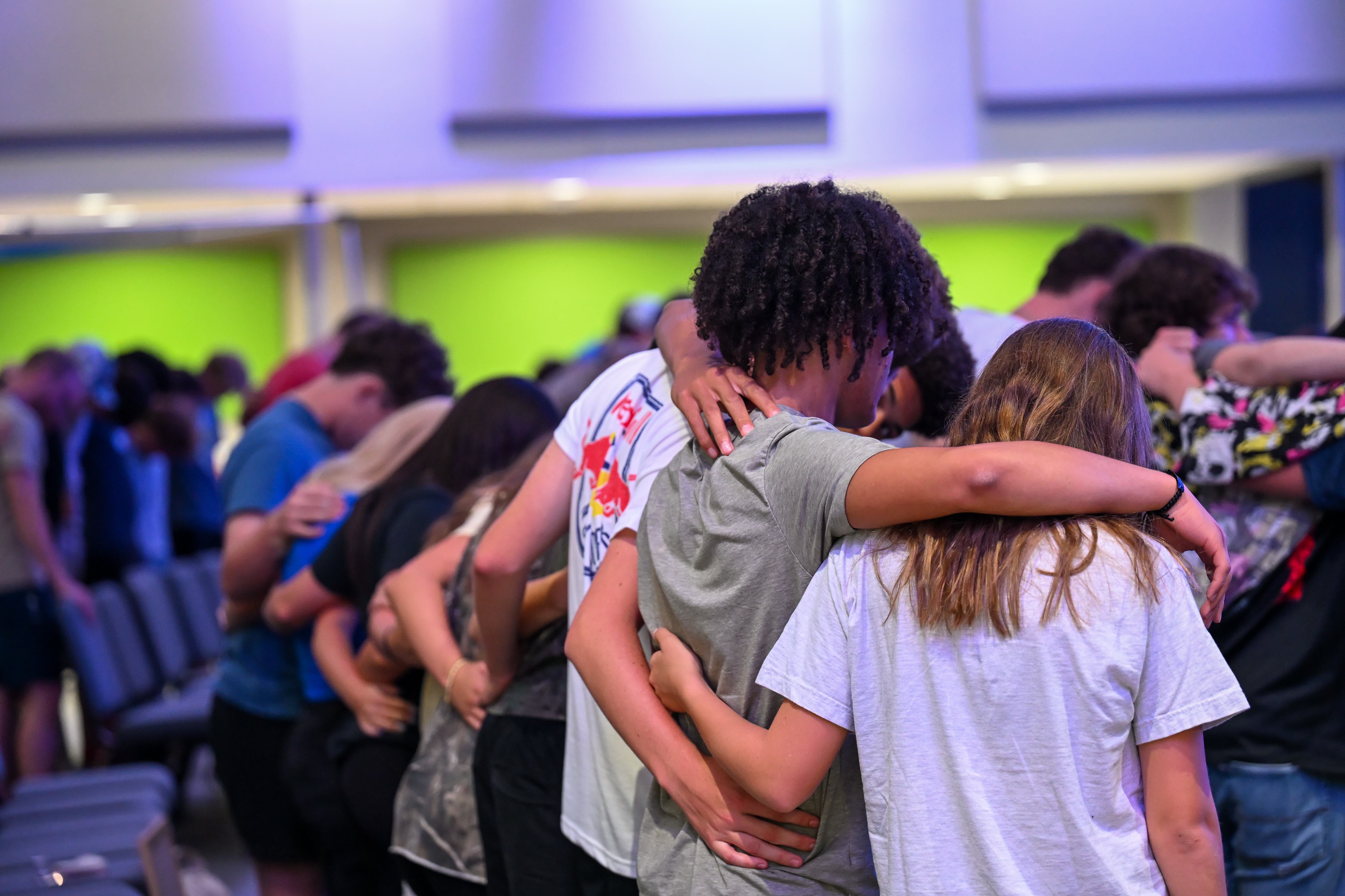 Young adults hanging out and smiling together